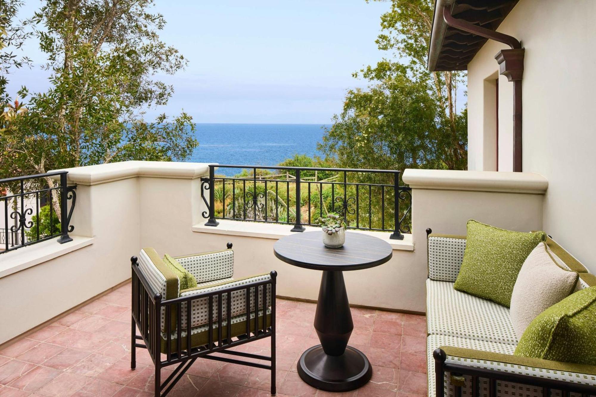 Signiture King Suite with Sofa Bed and Partial Ocean View
